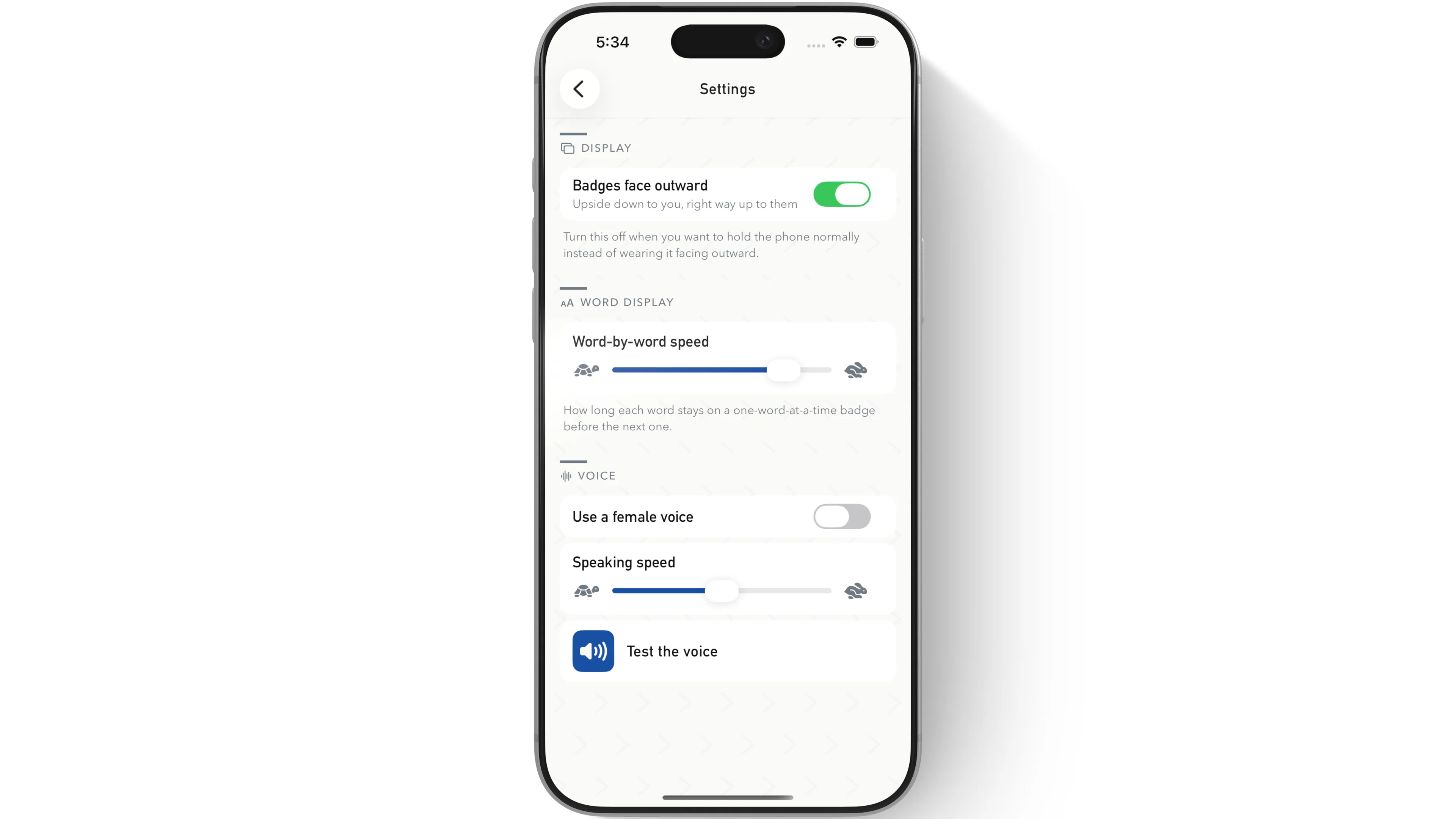 Walkie Talkie AAC settings for outward-facing badges, word-by-word speed, speaking speed and voice selection shown in an iPhone device mockup
