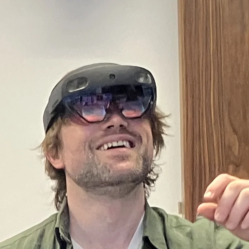 A participant evaluating a mixed-reality AAC system