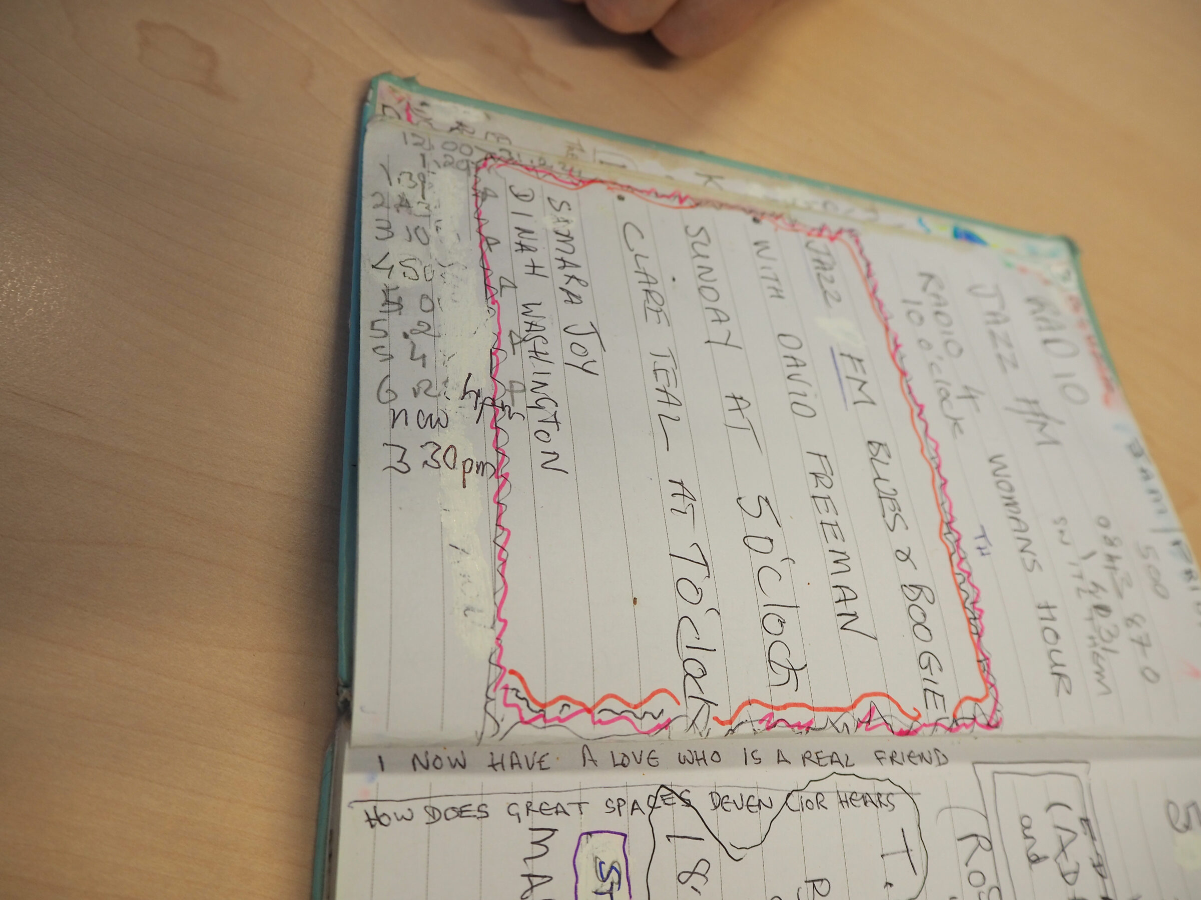 Diary pages showing music notes, jazz references and the phrase 'I now have a love who is a real friend'